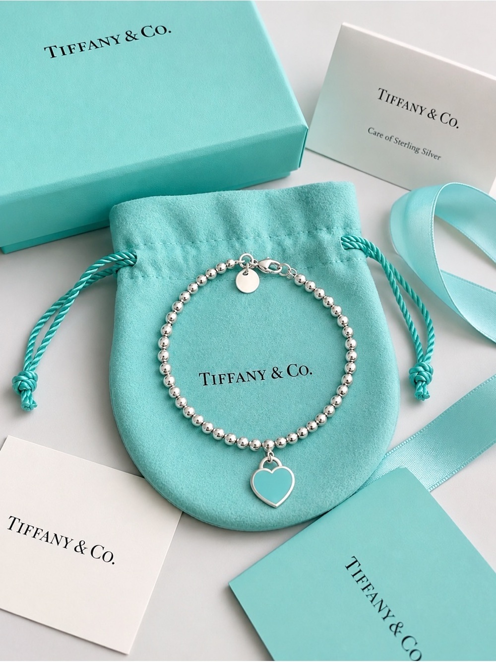 Tiffany & Co. Return to Tiffany Mini Blue Heart Tag 4mm Bead Bracelet 7”